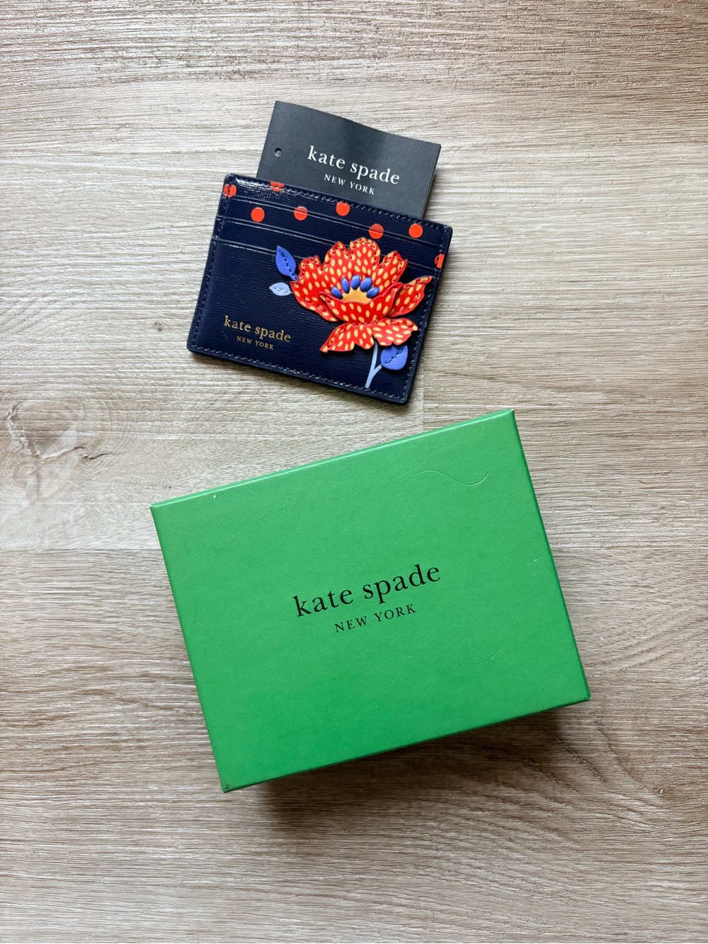 Kate Spade navy card holder with red floral applique and orange polka dots - Picture 5 of 5